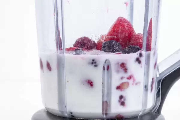 Raspberry Blackberry and Banana mixture for Smoothie in the blender