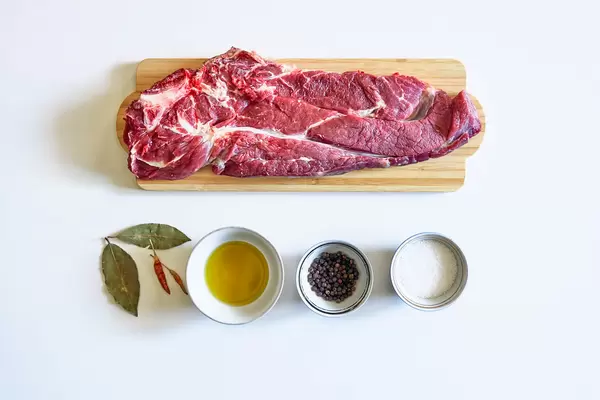 Raw beef steak and spices for cooking