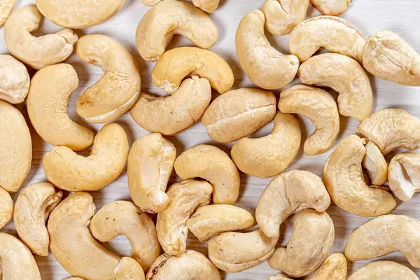 Raw cashews nut background. Top view (Flip 2019)