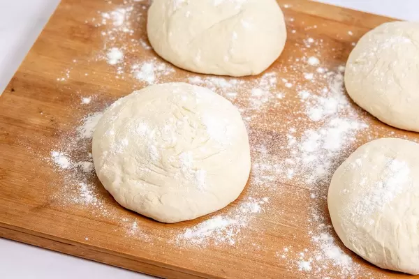 Raw Dough on the wooden board