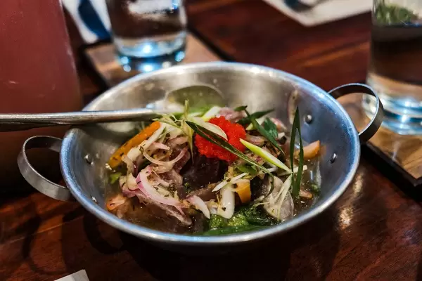 Raw fish mixed with vinegar and vegetables (Flip 2019)