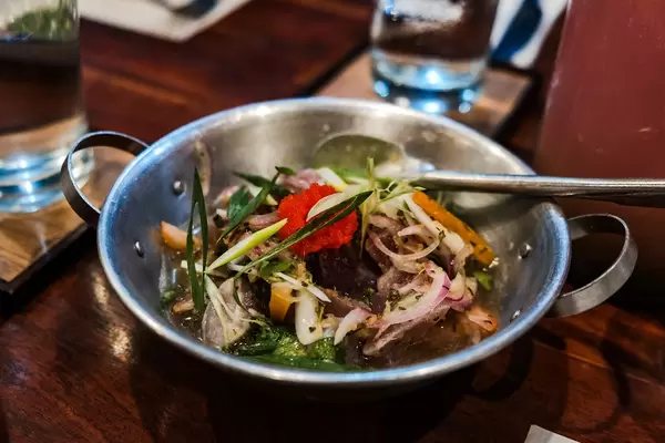 Raw fish mixed with vinegar and vegetables