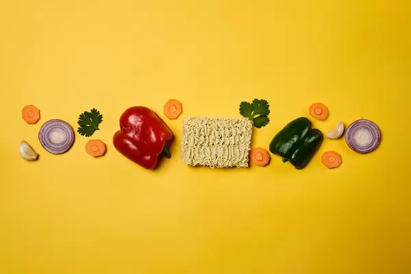 Raw instant food noodles with food ingredients