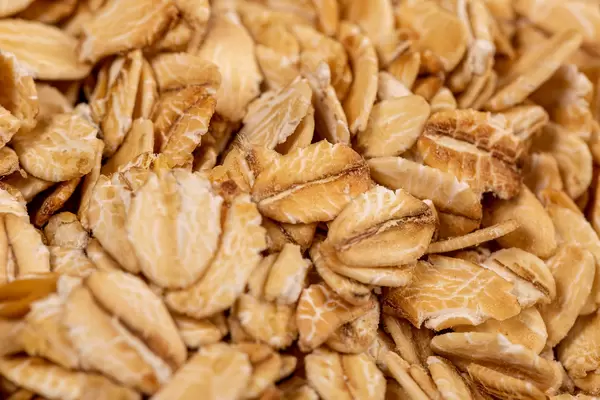 Raw oatmeal flakes close up