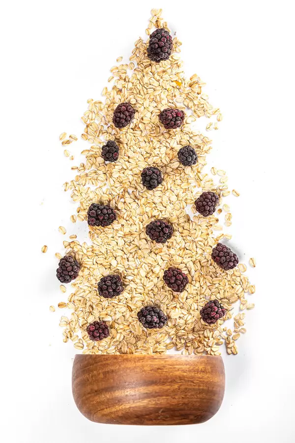 Raw oatmeal with fresh berries blackberry