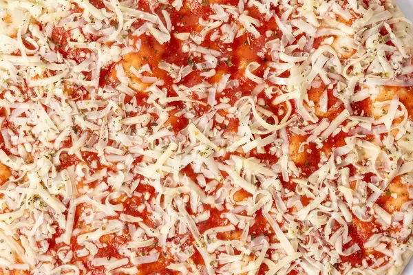 Raw Pizza Margharita closeup image (Flip 2019)