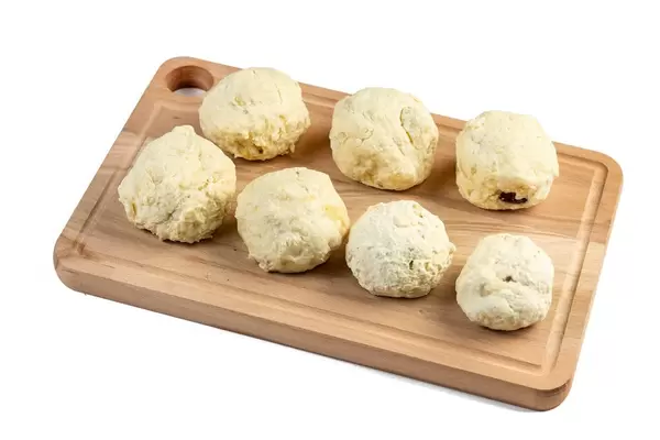 Raw Plum Dumplings on the wooden board