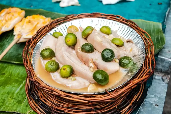 Raw pork marinated in calamansi (Flip 2019)