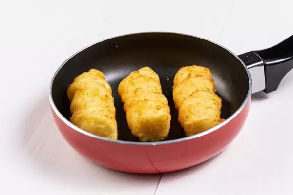 Raw Potato Croquettes in the Frying Pan (Flip 2019)