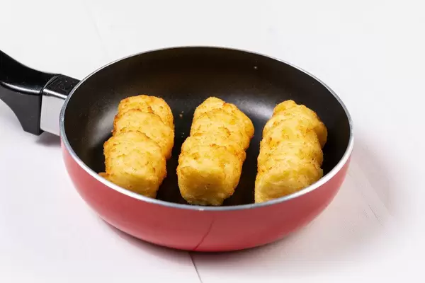 Raw Potato Croquettes in the Frying Pan