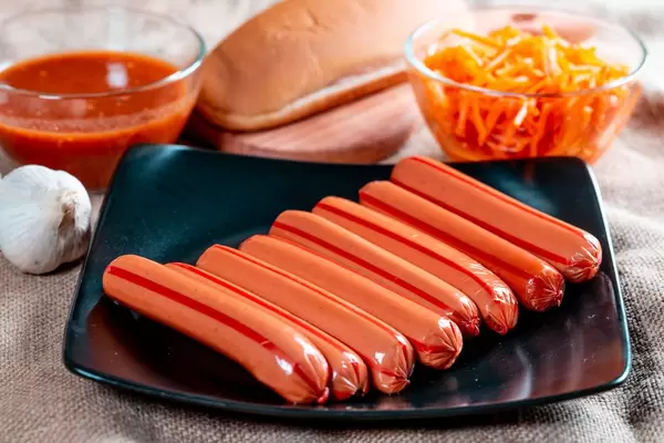 Raw sausages with sauce  Flip 2019