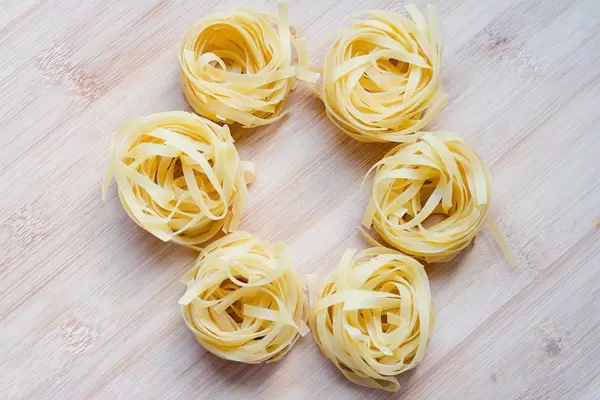 Raw tagliatelle pasta