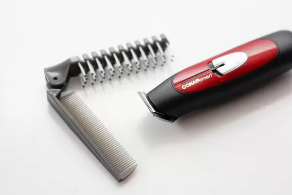 Red and Black Small Clipper on a White Background