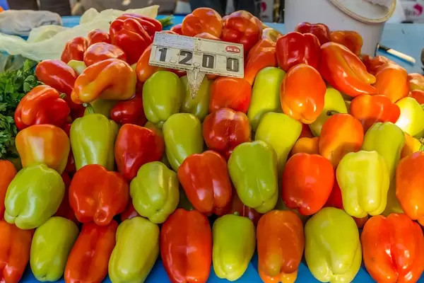 Red and green paprikas decorated on marketplace