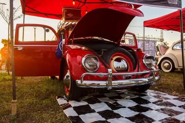 Red beetle on display at a car show