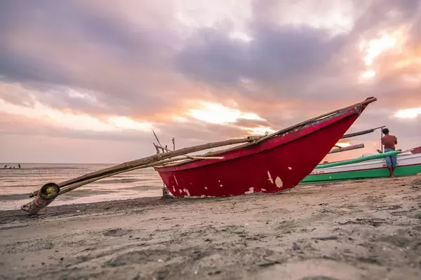 Red Fishing Boat docked in Villa Azul