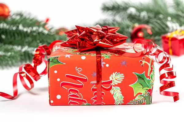 Red gift box with ribbon and bow