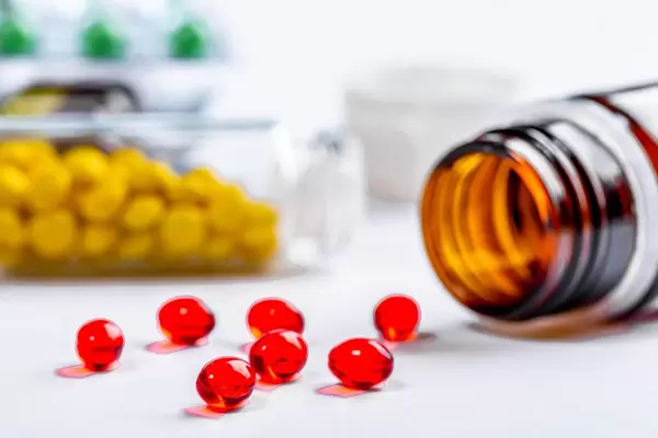 Red medical capsule close up (Flip 2019)