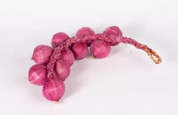 Red onions isolated on white background