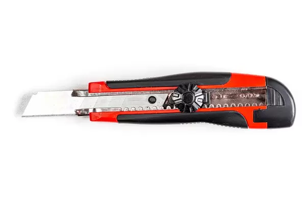 Red paper knife on white background