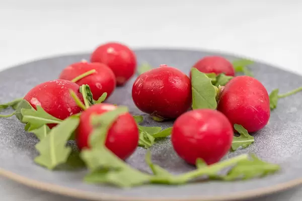 Red Radishes served on the plate