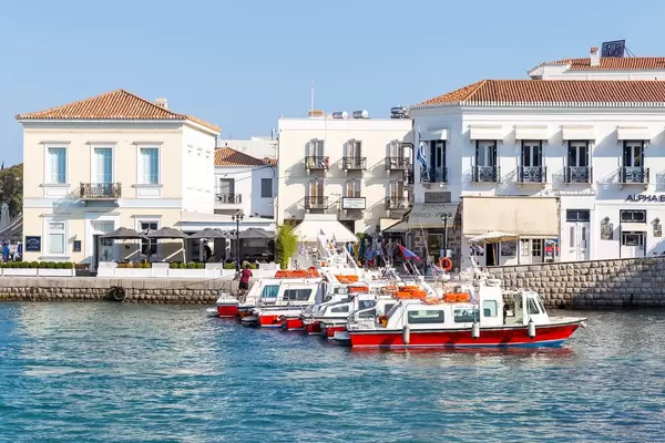 Red-white water taxis in the Greek port in the Myrtoan Sea