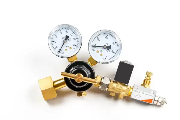 Reducer for a carbon dioxide cylinder on a white background