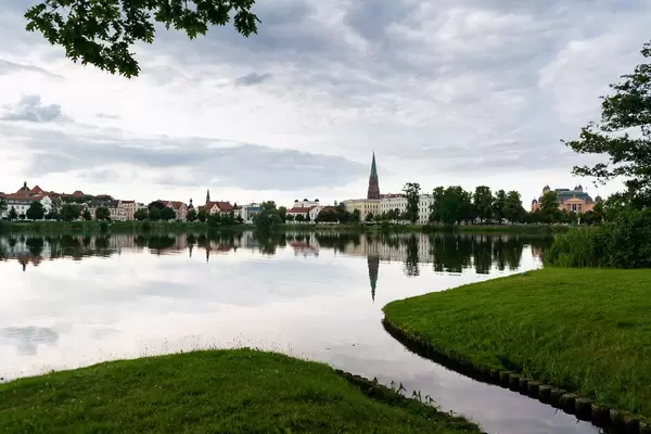 Reflection of Schwerin town and beautiful church in the lake