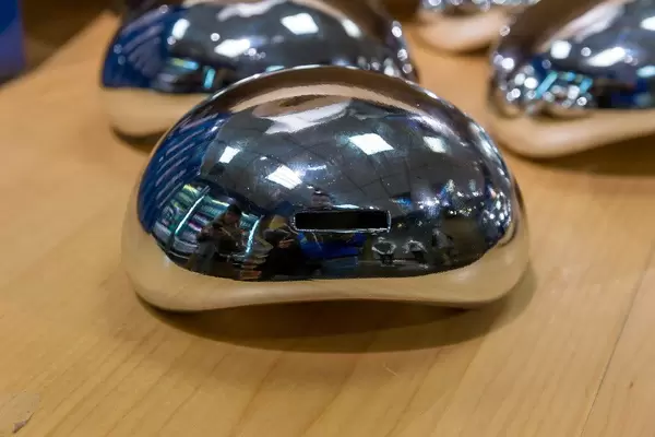 Reproduction of the Cloud Gate with an opening for coins, sold as a souvenir of Chicago
