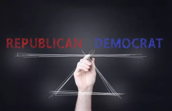 Republican and Democrat text on the scale.jpg
