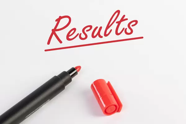 Results text with red marker pen