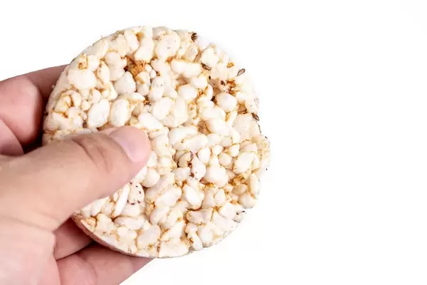 Rice Cakes with Flax and Sunflower in the hand