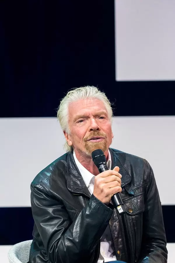 Richard Branson on stage of Digital X
