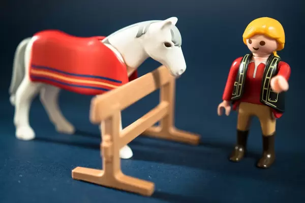 Rider talking with her horse