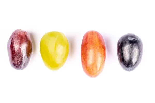 Ripe berries of grapes of different varieties, close-up