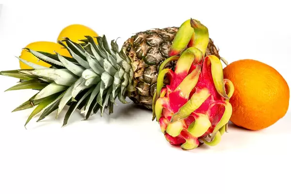 Ripe fresh exotic fruit on a white background