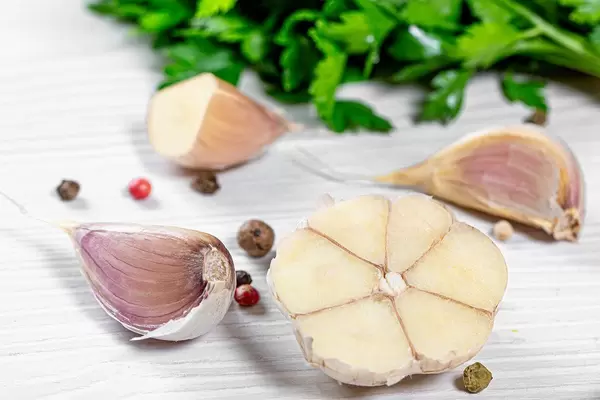 Ripe garlic with fresh parsley and pepper mixture