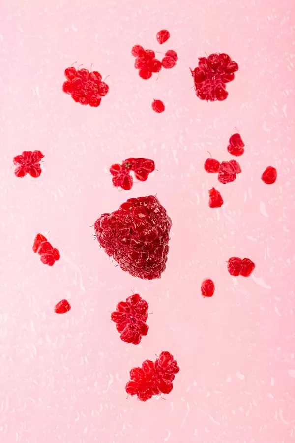 Ripe raspberries with water drops