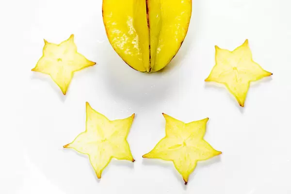 Ripe star fruit carambola or star apple on white background (Flip 2019)