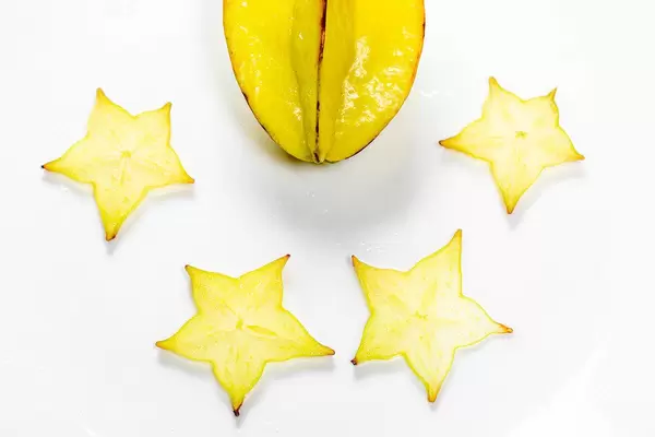 Ripe star fruit carambola or star apple on white background