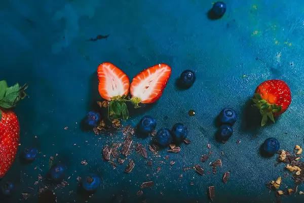 Ripe strawberries - cut and whole. (Flip 2019)