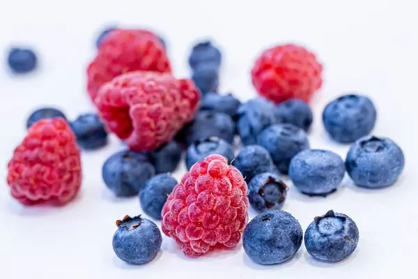 Ripe summer berries of blueberries and raspberries (Flip 2019)