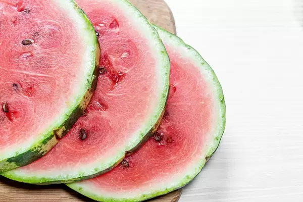 Ripe watermelon sliced in circles closeup
