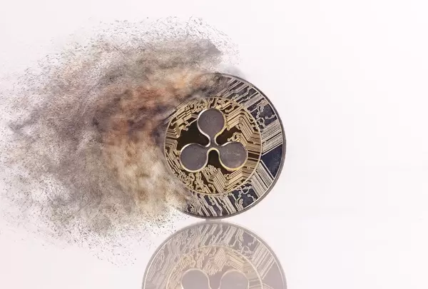 Ripple coin with smoke on white background