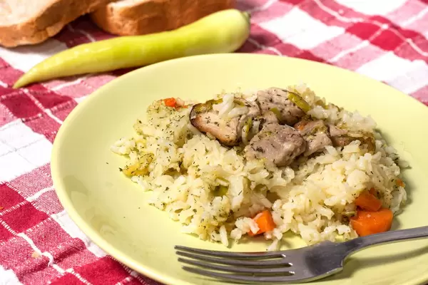 Risotto with Pork Meat meal served on the table