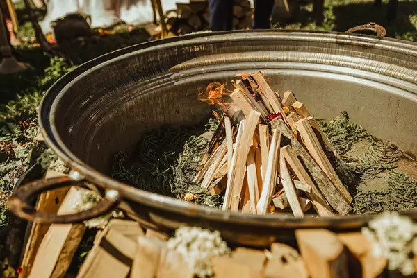 Ritual BonFire In Bowl WIth Plants And Wood