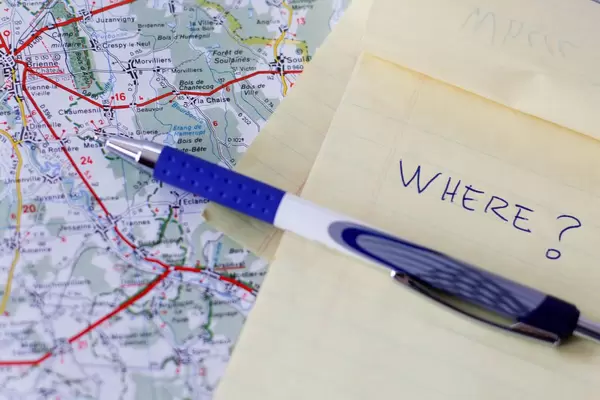 Road Map With Notebook And a Pen .