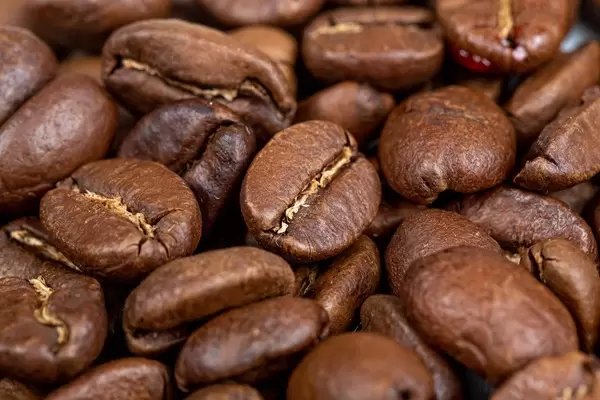 Roasted-coffee-beans-background-closeup.jpg