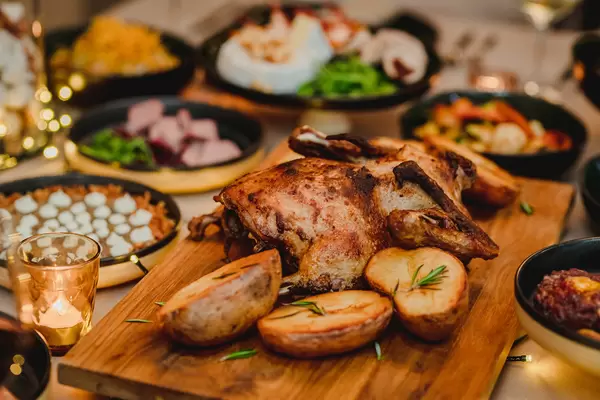 Roasted Duck Leg With Poatoes On Dinner Set