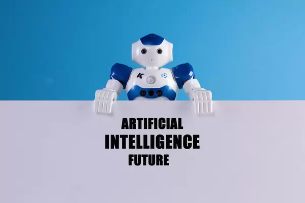 Robot holding a sign with Artificial Intelligence Future text